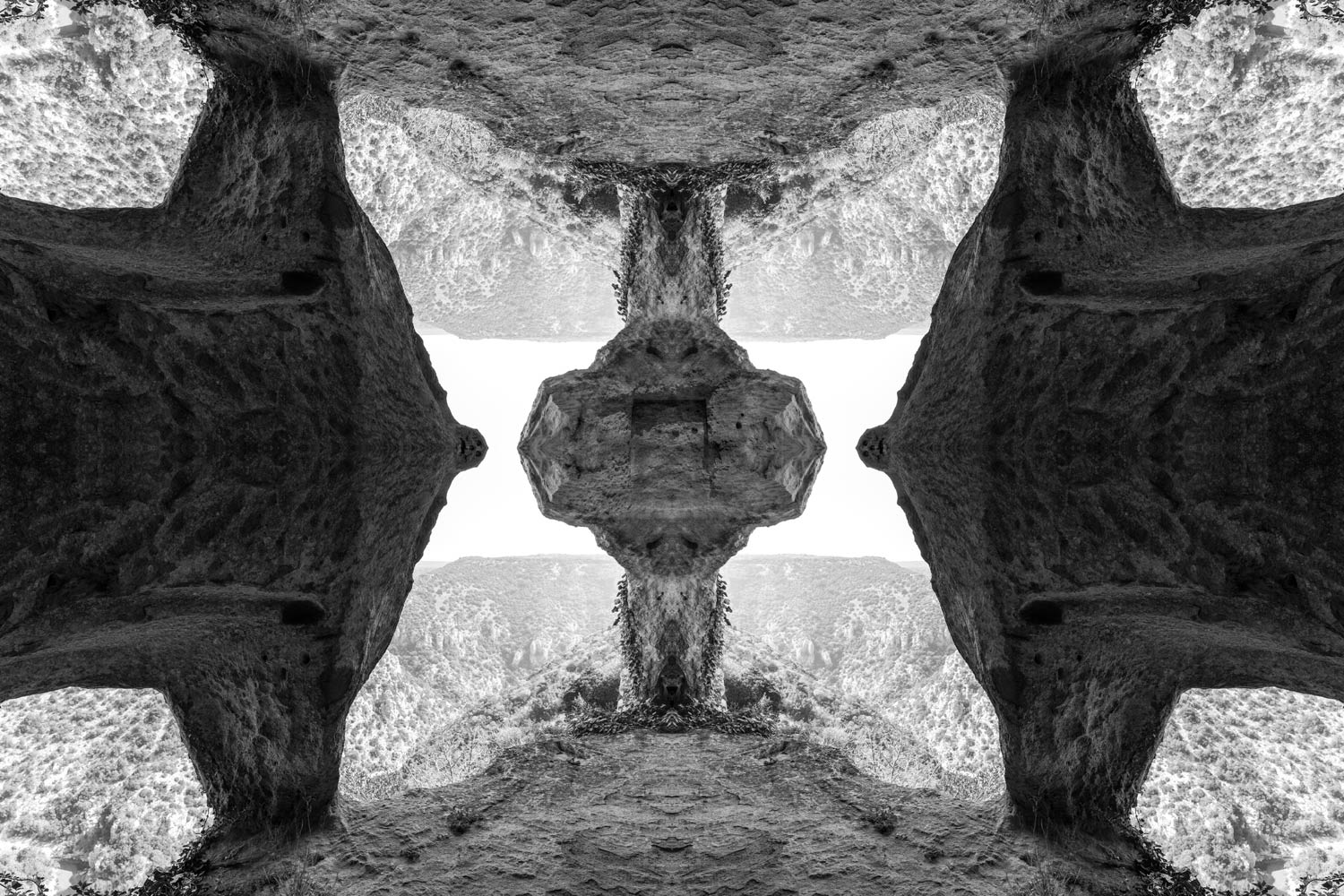 Mirrored cave landscape suspended between two directions